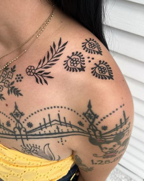 Collar Bone Tattoo American Traditional, Mexican Folk Tattoo, American Traditional Chest Tattoo Women, Cohesive Tattoos, Traditional Shoulder Cap Tattoo, Traditional Shoulder Tattoos For Women, Ornamental Stomach Tattoo, Romani Tattoos, Upper Shoulder Tattoos For Women