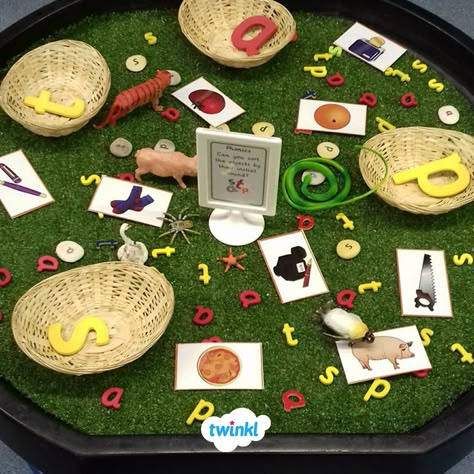 Practise phonics with this tuff tray exploration area. Ask children to sort the objects by their initial sounds for a fun and interactive language activity. Create a Twinkl account and download our sound cards and letters to create your own activity area.   #phonics #sounds #letters #words #tufftray #language #primary #school #education #resources #printablesforkids #indoorplay #learning #twinkl #twinklresources Phonics Tuff Tray Eyfs, Satpin Phonics Activities Eyfs, Phonics Satpin Activities, Sorting Activities Eyfs, Phonics Activities Eyfs Outside, Initial Sounds Activities Eyfs, P Sound Activities, Phonics Provision, Initial Sounds Activities