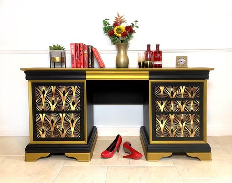 This opulent and eye-catching desk has everything you need when working from home. Painted in Coal Black and the blingiest of golds, this spacious piece features 7 drawers (including 2 hidden drawers at the top). The drawer fronts have been decoupaged in a stunning Art Deco style print which has been sealed and varnished for protection. This desk has been painted in Fusion Mineral Paint - a specialist furniture paint renowned for its quality and durability. The top has also been oiled for addit Upcycled Desk, Upcycle Desk, Desk Dressing Table, Art Deco Dressing Table, Vintage Chest Of Drawers, Painted Chest, Vintage Side Table, Upcycled Art, Vintage Chest