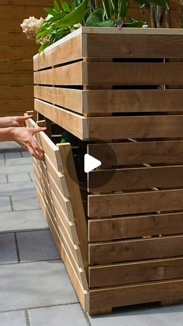 617K views · 11K likes | Marie | DIY Montreal on Instagram: "Adding hidden storage underneath my planter 🌱   Didn't want any visible hinges or anything to affect the look, so went with magnets!  Full video and plans 👉 link in profile   #pullsaw #magnets #neodymium #planterbox #planter #hiddenstorage #outdoordiy #woodworker #diywoodwork" Package Hiding Planter, Wood Box Diy, Planter Boxes Diy, Diy Montreal, Hidden Shelf, Diy Planter Box, Outdoor Stuff, Diy Deck, Deck Box