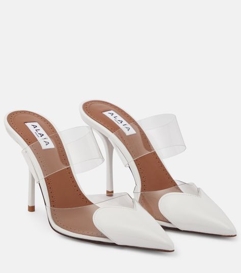 Cœur patent leather and PU mules in white - Alaia | Mytheresa Alaia Heels, Lipstick Bag, Chain Strap Bag, Blue Pumps, Floral Shoes, Polyvinyl Chloride, White Heels, Pointed Toe Shoes, High Heel Pumps