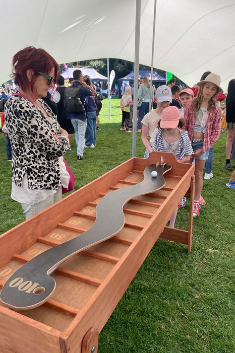 A cue forms for a turn at the Zig Zg game at the Play Festival in Auckland. Diy Wooden Games, Christmas Carol Game, Party Games Group, Diy Carnival Games, Fall Festival Games, Game Booth, Diy Montessori Toys, Big Games, Festival Games