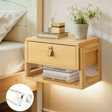 The dreamy floating Nightstands Lighting Designs brightness can be adjusted,you will always find your favorite light to raise bedroom vibes. It will create a fantastic ambiance in your bedroom in the dark. This floating bedside table cleverly combines drawer and open storage features. The spacious and smooth drawer can hold plenty of books, magazines, daily necessities, and more to keep your bedroom tidy. The open storage area allows you to access items at any time and is suitable for some commo Floating Bedside Drawer, Corner Nightstand Ideas, Floating Bed Side Table, Raised Bedroom, Floating Bedside Shelf, Side Table Shelf, Modern Night Stand, Floating Side Table, Bedroom Tidy