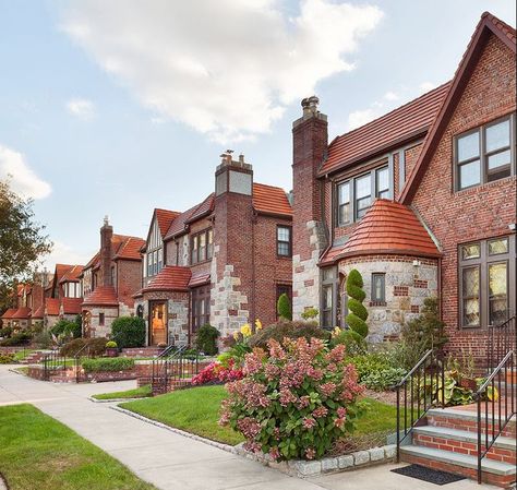 A Bayside, Queens Tudor with a turreted entry and stained glass windows is on the market for $988,000. Forest Hills Gardens, Tudor Homes, Arched Front Door, City Houses, Storybook Homes, Queens Nyc, Exterior Stain, Tudor Style Homes, Fairytale Cottage