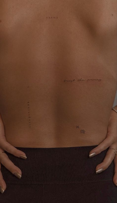 Small Cursive Back Tattoo, Minimalist Font Tattoo, Tiny Tattoos Cute, Diluted Ink Tattoo, Writing On Back Tattoo, Avery Woods Tattoo, Mini Tattoo Placement Ideas, Divine Back Tattoo, Sticker Tattoo Back