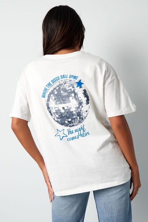 Step into the groove with our 'Where the Disco Ball Spins, the Night Comes Alive!' t-shirt. Perfect for beach days, city outings, or casual hangouts, this tee keeps your style lively and fun wherever you go. 🌟🌊🏙️ Shop now! #discoshirt #casualstyle #beachwear #citychic #graphictee #yehwang #yehwangwholesale Disco Ball Shirt, Disco Ball Graphic, Balls Shirt, Disco Shirt, Disco Ball, Beach Days, City Chic, Beach Day, Casual Style