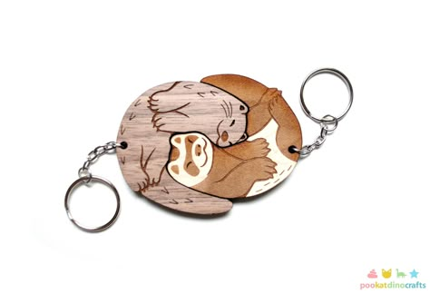 This ferret and river otter are engraved and cut from beautiful maple and walnut wood. They fit perfectly together, and the natural wood grain finish create a unique set! My original interlocking charm design is slightly less than 3.25" inches wide when linked together. The individual keychains on their own are close to 2.25" inches wide each. They are laser-cut in-house from maple and walnut veneered plywood that is approximately 1/4" thick. This listing is for the set of two keychains, they ar Laser Cut Jewelry Wood, Laser Cut Projects, Laser Cut Keychain, Friendship Keychains, Veneer Plywood, River Otter, Wood Keychain, Engraved Keychain, 3d Laser