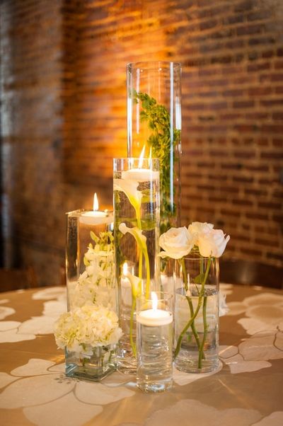 Tropical Floating Candles, Wedding Table Decorations Floating Candles, Flowers In Floating Candles, Submerged Flower Centerpiece Wedding, Floating Candles Wedding Centerpieces Reception Ideas, Flowers In Water Centerpieces, Water Centerpiece Wedding, Gala Dinner Centerpieces, Floating Candles With Flowers