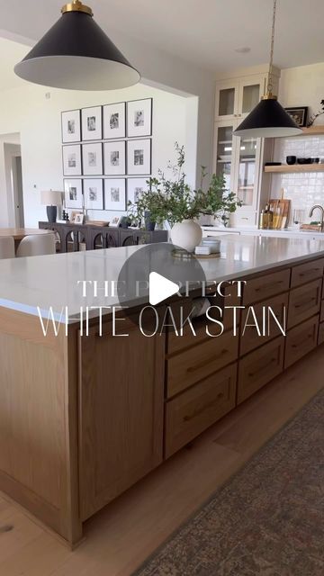 Cindy Nguyen | transitionalmodernhome on Instagram: "IYKYK, it is a struggle looking for the perfect white oak stain.   If you’re looking for a neutral medium toned stain for white oak, this @sherwinwilliams custom stain complements the warm and earthy tones so perfectly. I used it on my kitchen island, ceiling beams in my LR/DR, and primary BR.   ✨SAVE this for reference later if you want to come back and look at it later   ✨Comment STAIN to receive the photo of the formula label in your DMs. You must be following me to see my DM come through!   Tip: ALWAYS test out the stain on a smaller piece of white oak in the room you’re going to be using it in with other finishes.   #interiordesign #customstain #whiteoak #affordablefinds #neutralhome #whiteoakcabinets #remodeling #organicmodern" White Oak And Cream Kitchen Cabinets, White Oak Stain Formula, White Oak Island Kitchen, White Oak Stain Colors, White Oak And White Kitchen, White Oak Kitchen Island, White Oak Stain, White Oak Island, Kitchen Island Ceiling