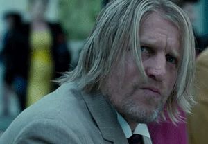 Haymitch.  Hunger Games.  Watching-Katniss-on-screen. Haymitch Abernathy Gif, Haymitch Hunger Games, Haymitch Abernathy, Marvel Villains, Hunger Games, Gif, Marvel, Screen, Fan