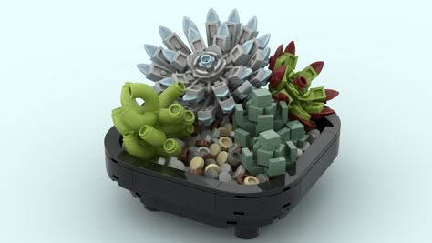 I really like succulent arrangements, so I thought I would have a go at making one of my own out of Lego!There are so many different types of ... Lego Succulent, Lego Garden, Lego Aesthetic, Lego Office, Lego Hospital, Lego Botanical, Lego Plants, Lego Wall Art, Lego Build Ideas