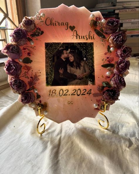 🥰Another varmala preservation 🧿❣️ . . . . #resin #resinart #resinartwork #resincraft #resinvarmalapreservation #weddingphotography #weddinggarlands #dryflower #resinelegance #couplephotoframe #resincouplephotoframe #resincoupleplatter #resinphotoframe #instagram #preservation Varmala Preserve In Resin Photo Frame, Varmala Preserve In Resin, Resin Art Photo Frame, Rose Preserved In Resin, Varmala Preservation, Handmade Gifts For Husband, Decorations For Wedding, Birthday Photo Frame, Resin Jewelry Diy