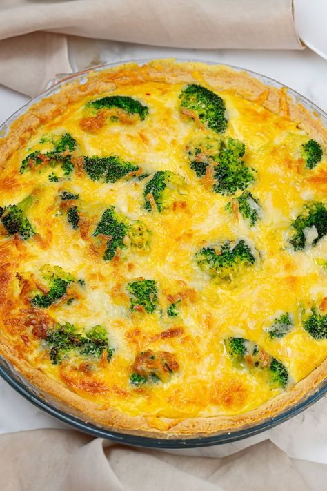 Discover the ultimate comfort food with our Broccoli Cheddar Cheese Quiche recipe. This savory, mouth-watering quiche combines tender broccoli florets with rich cheddar cheese, baked to perfection in a flaky crust. Whether you're looking for an impressive brunch option or a hearty weeknight dinner, our easy-to-follow recipe ensures a delicious meal every time. Quiche Recipes Broccoli Cheese, Broccoli Quiche Recipes Easy, Broccoli And Cheese Quiche Easy, Broccoli Cheddar Quiche Recipes, Broccoli Cheese Quiche Recipes, Quiche Broccoli Cheese, Cheddar Cheese Quiche, Broccoli And Cheese Quiche, Broccoli Cheese Quiche