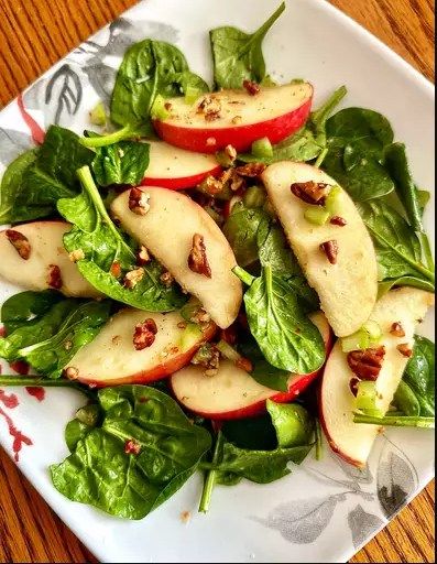 Apple Spinach Salad is a fresh, nutritious dish that combines the sweetness of apples with the earthy flavor of spinach, all tossed in a tangy dressing. This salad is perfect for a healthy lunch or as a side dish for dinner. Here’s how to make it: Apple Spinach Salad Recipe 🍎🍃 Enjoy the delightful blend of crisp apples and tender spinach in this refreshing and easy-to-make salad. Ingredients: For the Salad: 6 cups fresh baby spinach leaves, washed and dried 2 medium apples (such as Fuji ... Fennel And Apple Salad, Wilted Spinach Salad, Shallot Vinaigrette, Bacon Dressing, Arugula Salad Recipes, Sliced Apples, Wilted Spinach, Pecan Salad, Pear Salad