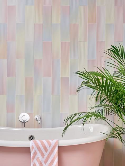 Pink bathtub in front of a wall tiled with pastel tiles. Rainbow inspired theme Latest Bathroom Trends, Pastel Bathroom, Art Deco Style Interior, Rainbow Tile, Pastel House, Ceramic Floor Tiles, Childhood Nostalgia, Bathroom Trends, Wall And Floor Tiles