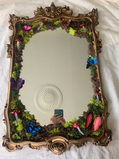 I made a moss mirror! Inspired by @nonbinaryfairie and @carolinequinner on TikTok Enchanted Forest Mirror Diy, Cute Mirror Frame Ideas, Moss And Crystal Mirror, Moss Art Mirror, Mirror With Moss Frame, Moss Framed Mirror, Moss Mirror Full Length, Fairy Garden Mirror Diy, Mirror Moss Art