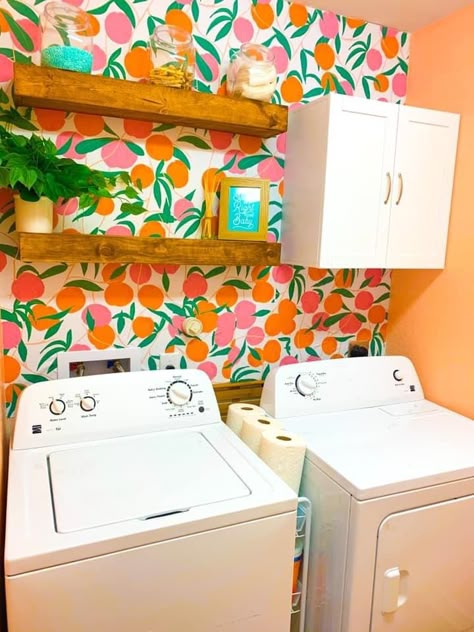 Cute, peach-themed, laundry room Sunny Laundry Room, Laundry Room Ideas Colorful, Laundry Room Bright Colors, Coral Laundry Room Ideas, Small Colorful Laundry Room, Coral Laundry Room, Bright Color Laundry Room Ideas, Bright Laundry Room Colors, Peach Laundry Room