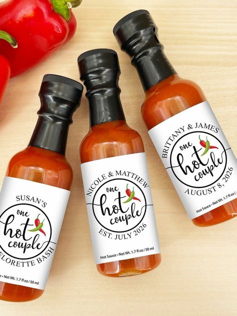 Many of these can be personalized, too. Ikea Hacks Wedding, Sauce Wedding Favors, Bridal Shower Food Ideas Lunch, Hot Sauce Wedding, Hot Sauce Wedding Favors, Cool Party Favors, Wedding Souvenir Ideas, Creative Wedding Souvenirs, Hot Sauce Favors