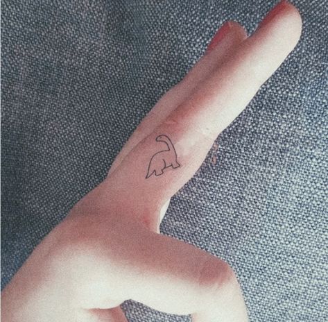 Micro Dinosaur Tattoo, Long Neck Dinosaur Tattoo, Tattoo Ideas Dinosaur, Brontosaurus Tattoo, Small Dinosaur Tattoo, Funny Small Tattoos, Dinosaur Outline, Long Neck Dinosaur, Tattoos 2024