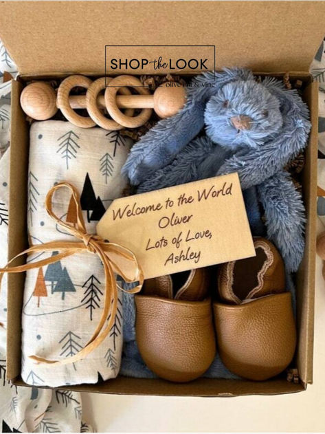 Curated baby boy gift box with tree print swaddle, plush rabbit blanket, leather booties, beechwood rattle, and personalized wood tag. Boy Woodland Nursery, Mothers Day Gift Basket, Baby Toys 6 Months, Gifts For New Mom, Wooden Baby Rattle, Boy Box, Baby Basket, Plush Rabbit, Baby Shower Gift Basket