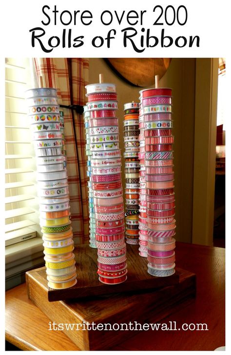 It's Written on the Wall: Craft Room Organizing-Store over 200 Rolls of Ribbon in a 12" square Space! #Crafts Craft Organization Organizing House, Craft Room Organizing, Square Space, Ribbon Organization, Craft Storage Ideas, Ribbon Storage, Scrapbook Storage, Craft Sewing Room, Dream Craft Room