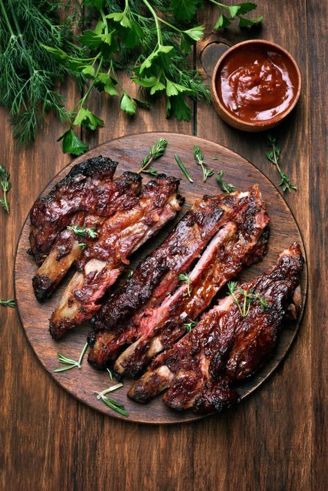 The Secret To Moist, Tender, Fall-Off-The-Bone Ribs Every Time - BlackDoctor.org - Where Wellness & Culture Connect Barbecue Pork Ribs, Bbq Pork Ribs, Rib Meat, Barbecue Ribs, Bbq Sauce Recipe, Wooden Plate, Bbq Pork, Rib Recipes, Pork Ribs