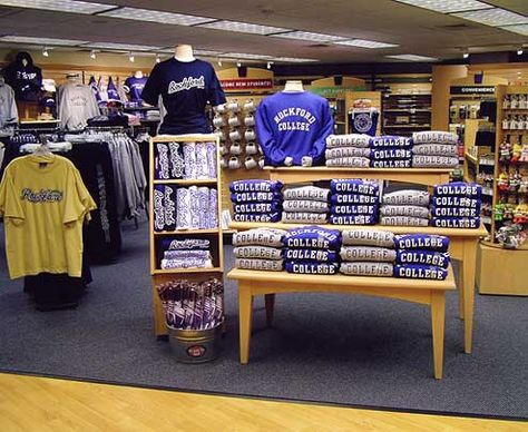 Rockford College Bookstore Retail Shirt Display Ideas, College Bookstore Displays, College Bookstore Merchandising, College Store Display Ideas, Bookstore Layout, Fanshawe College, Gift Shop Displays, College Merch, College Bookstore