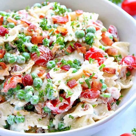 Bacon Ranch Pasta Salad Recipe - bow tie pasta, bacon, cheddar, tomatoes and peas with creamy Ranch dressing make this salad an easy and delicious side dish! Bacon Ranch Pasta, Easy Macaroni Salad, Bacon Ranch Pasta Salad, Fresh Corn Salad, Avocado Tuna Salad, Creamy Ranch Dressing, Best Macaroni Salad, Ranch Pasta Salad, Ranch Pasta