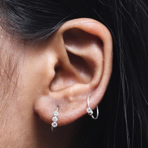 Simple Silver Hoops with gemstones arranged on the Earlobe and upper lobe of a Brown girl, in Delhi , India 🇮🇳 Upper Earlobe Piercing, Hoop Piercing, Upper Lobe, Brown Girl, Delhi India, Silver Hoops, Keychains, Ear Cuff, Piercings