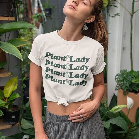 The Coven (@thecovenbasalt) • Instagram photos and videos Gardening Outfits, Womens Graphic Tees, Plant Parent, Gardening Outfit, Cute Graphic Tees, Weird Shirts, Black Model, Plant Lady, Retro Shirts