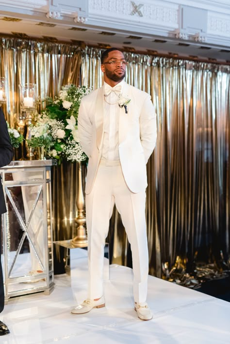 Dream Wedding Tuxedo, Black Man Groom Attire, All White Wedding Outfit Men, White And Gold Tuxedo Wedding, White Men Wedding Suit, Black Man Suit Wedding Grooms, Men White Suit Wedding, Cheap Luxury Wedding, Cream Color Tuxedo