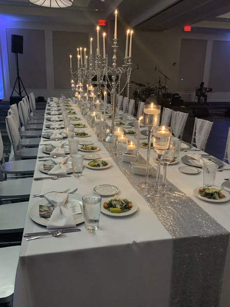 Silver And White Anniversary Decorations, White Prom Decorations, Silver Decorations Wedding, Silver Grey And White Wedding Theme, Black White And Silver Dinner Party, Silver Prom Decorations, Silver Reception Decor, White And Silver Decorations Party, Silver And White Table Setting