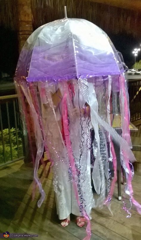 Susan: I went to Google, typed in inexpensive, creative Halloween Costumes and found a few photos of the jellyfish idea. I am an elementary grade level science teacher and began to... Diy Jellyfish Costume, Jellyfish Halloween Costume, Jellyfish Halloween, Bioluminescent Jellyfish, Dome Umbrella, Diy Jellyfish, Jellyfish Costume, Fish Costume, Homemade Costume