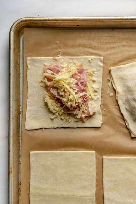 Ham And Cheese Turnovers Puff Pastries, Ham Swiss Puff Pastry, Ham And Cheese Turnovers, Puff Pastry Squares Recipes, Ham And Cheese Puff Pastry Appetizers, Puff Pastry Ham And Cheese Pockets, Puff Pastry With Ham And Cheese, Ham And Swiss Puff Pastry, Puff Pastry Hot Pockets