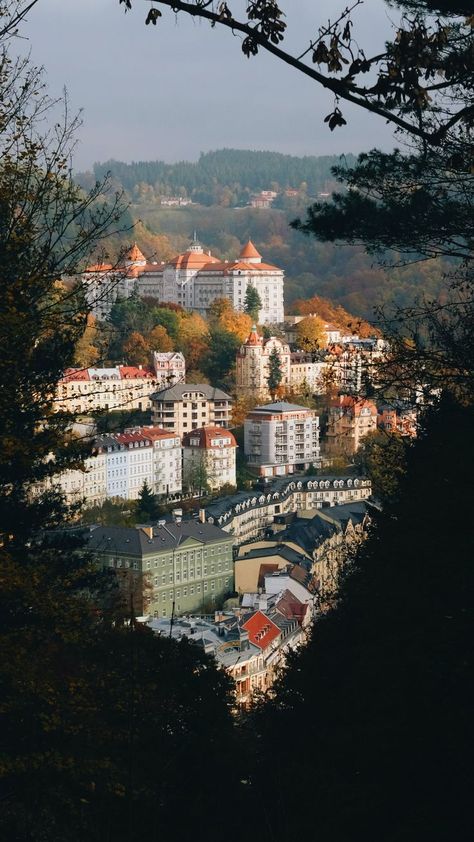 Behold the beauty of Karlovy Vary! A picturesque Czech spa town nestled in forested hills, Karlovy Vary is the ideal spot for a peaceful vacation. Relax by the banks of the winding Tepla River, unwind at one of its many luxe thermal springs, or take a romantic stroll through its scenic alleyways. There's something for everyone - and it's an experience you'll never forget! Karlovy Vary Czech Republic, Delta Girl, World Of Wanderlust, Karlovy Vary, The Spa, Spa Treatments, The Culture, Dream Destinations, Tourist Destinations