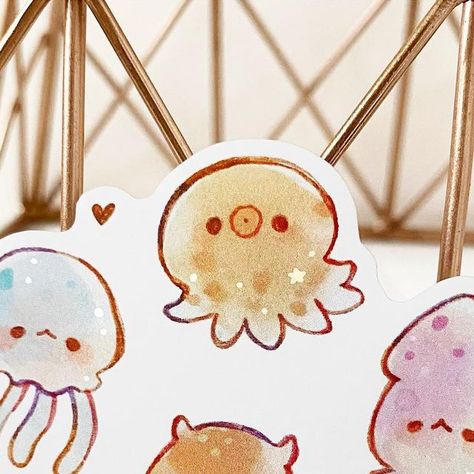 mocha ☕️ on Instagram: "Here are the individual stickers coming out May 20th, 3 PM EST!🥰 Enjoy! . . . . ⭐️ Etsy store: check bio🌻 - - - - - - - - - - - - - - - - - #instaart #myart #vinyl #artcollective #cuteart #cute #sweet #stickers #love #adorable #art #simple #artwork #cutestickers #instagood #artist #drawing #traditionalart #pastel #octopus #style #colorful #cutedrawings #cats #pastelart #kawaiiart #cutenessoverload #candy #relateable #instadaily" Octopus Drawing Simple, Cute Octopus Drawing, Simple Fish Drawing, Octopus Doodle, Kawaii Fish, Kawaii Octopus, Octopus Drawing, Sticker Inspo, Simple Artwork