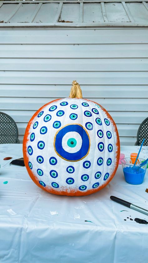 Evil Eye Pumpkin Painting, Celestial Painted Pumpkins, Evil Eye Pumpkin, Witchy Pumpkin Painting, Creative Pumpkin Painting, Turkish Evil Eye, Halloween Pumpkin Designs, Creative Pumpkins, Eye Painting