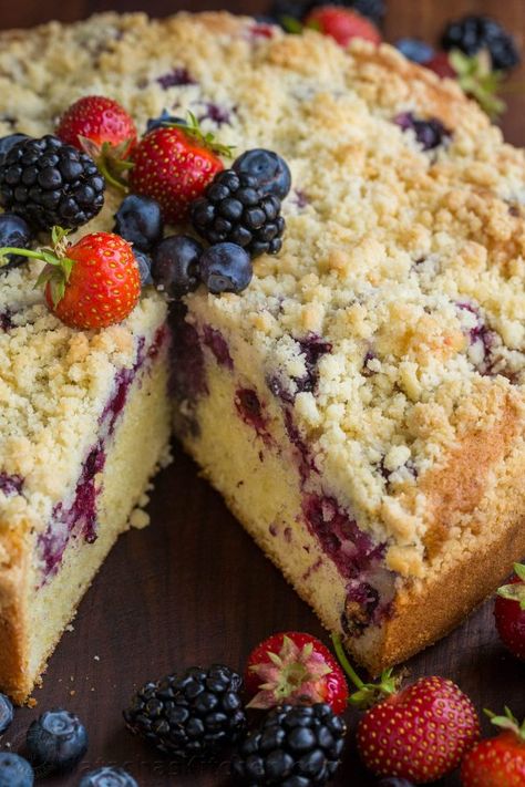 Must-try Berry Crumb Cake Recipe with a buttery crunchy topping, juicy layer of strawberries, blueberries and blackberries and a soft, airy cake. This crumb cake rises beautifully and looks stunning. No one has to know it was SUPER EASY. One of our top easy cake recipes! | natashaskitchen.com Berry Crumble Cake, Crumble Cake Recipe, Berry Cake Recipe, Crumb Cake Recipe, Crumble Cake, Strawberries Blueberries, Berry Cake, Best Chocolate Cake, Coffee Cake Recipes