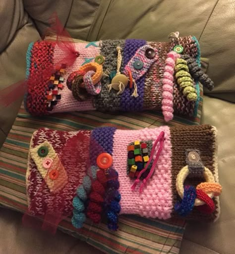 Pin by Jan Quigley on Twiddle Mitts & Twiddle Books | Fidget quilt, Sensory blanket, Fidget blankets Crochet Fidget Blanket, Fidget Sleeves, Twiddle Muff Ideas, Fidget Ideas, Fidget Mats, Hand Muffs, Fidget Quilts, Sensory Items, Hand Muff