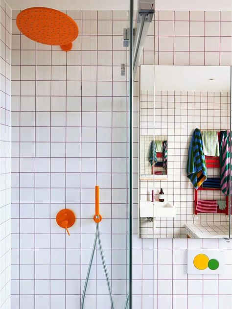 Bathroom Tile Ideas for Every Kind of Home | domino Colorful Grout, Colourful Bathroom, Graphic Tiles, Quirky Bathroom, Striped Tile, Coloured Grout, Bathroom Tile Ideas, White Subway Tiles, Colourful Tile