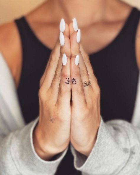 Growth And Change Tattoos, Spiritual Finger Tattoos For Women, Om Tattoo Designs, Om Tattoo Design, Tattoo Design For Hand, Small Finger Tattoos, Finger Tattoo For Women, Ankle Tattoos For Women, Hand And Finger Tattoos