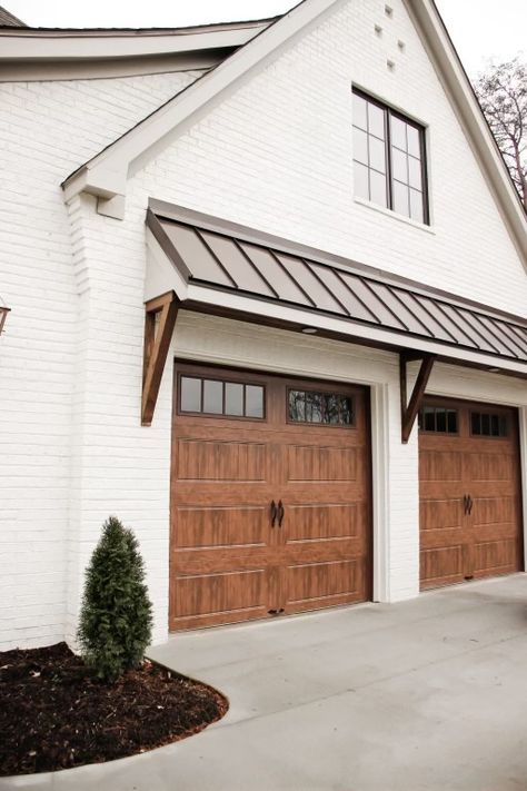 Cover Over Garage Door, Brick And Siding Garage, Awning On Front Of House, Room Over Garage Exterior, Homes With Metal Awnings, Brick Garage Detached, Awning Above Garage Door, Wood Front Door And Garage Door, Farmhouse Exterior Garage Doors