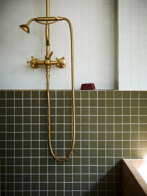 Trending on Remodelista: Kitchen & Bath Inspiration - Gardenista Remodelista Kitchen, Brass Shower Head, Dark Windows, Tin Panel, Bath Inspiration, London Kitchen, Spa Style, Bad Inspiration, Circular Mirror