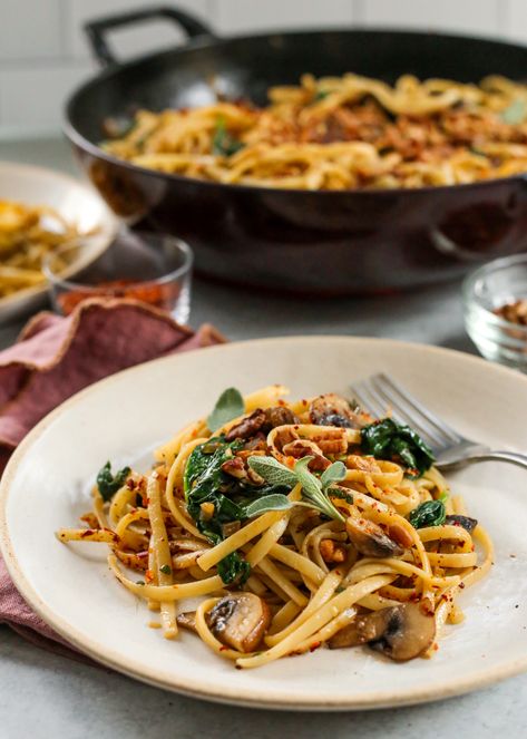 With chopped pecans, fresh sage, and a simple brown butter sauce, this Brown Butter Mushroom Pasta recipe is the perfect cozy pasta recipe for fall. It’s a simple, forgiving recipe for home cooks, but can really impress with rich flavor and beautiful colors. #brownbutter #brownedbutter #easypastarecipes #fallpastarecipes #vegetarianfallrecipes #pastadinner Butter Mushroom Pasta, Cozy Pasta, Pasta With Spinach, Recipe For Fall, Mushroom Recipes Pasta, Brown Butter Sauce, Mushroom Dish, Fresh Sage, Butter Pasta