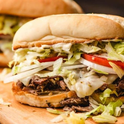 Shredded Beef Sandwiches - NeighborFood Shaved Beef Sandwich, Roast Beef Wrap, Shredded Beef Sandwiches, Shaved Beef, Hot Roast Beef Sandwiches, Slow Cooker Shredded Beef, Beef Sandwiches, Zesty Sauce, Roast Beef Sandwiches