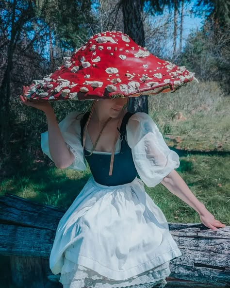 A friendly poke of a reminder that I made this mushroom hat, painted this frog suit and sewed these atrocious boot covers. Also, it's all on my YouT🐸be Check me out @avavav #cosplay #cosplayerofinstagram #whimsical #cottagecorecommunity #cottagecore #diycrafts #diy #summerween #frogs #fitcheck #fitgirls #lgbtq🌈 #androgynous #slay Giant Mushroom Hat, Mushrooms Costume, Mushroom Costume Women, Mother Spore, Forest Themed Birthday, Mushroom Cosplay, Mushroom Hats, Mushroom Outfit, Eve Costume