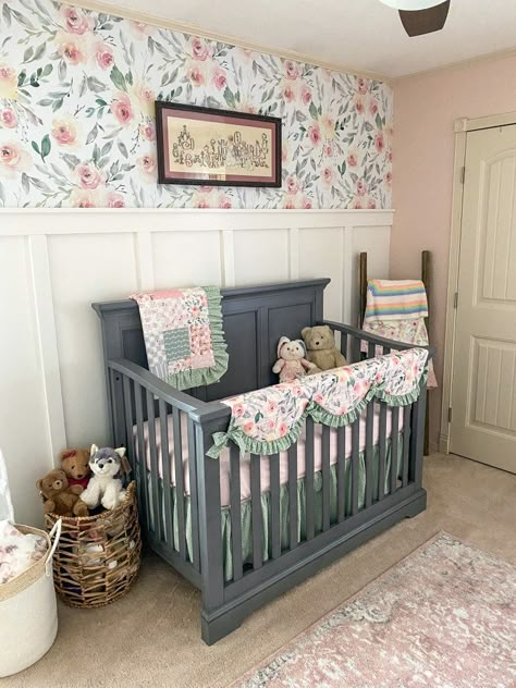 Joanna Gaines Baby Nursery, Nursery Wallpaper Accent Wall Farmhouse, Baby Girl Nursery Grey Crib, Girl Nursery Themes Flower, Grey Crib Nursery Girl, Nursery Feature Wall Ideas, Gray Crib Nursery Girl, Board And Batten Nursery Girl, Spring Nursery Ideas