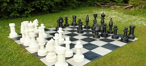 Build a life-size chess or checker board this weekend in your backyard. With an 8-foot area, 64 pavers in two different colors, and a few tools, this is an easy project for any DIYer. Life Size Games, Backyard Games Kids, Diy Yard Games, Family Backyard, Fun Outdoor Games, Yard Games, Backyard Games, Backyard Living, Green Lawn