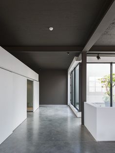 Basement Industrial Black And White, Dark Ceiling, Grey Ceiling, Office Ceiling, Minimal Lighting, Casas Coloniales, Dark Walls, Black Ceiling, Grey Flooring