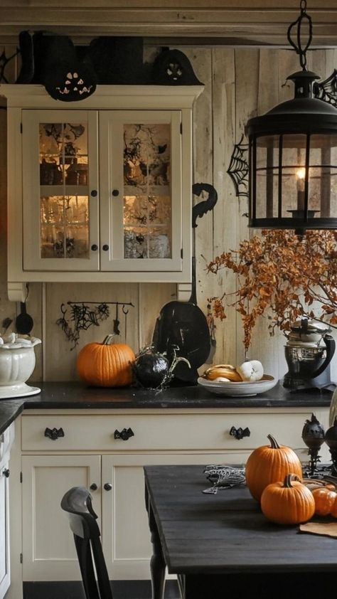 Transform your kitchen into a spooky sanctuary with Halloween decor that's both festive and functional. Add eerie elegance to your culinary space with themed dish towels, ghostly serving platters, and pumpkin-shaped canisters. Create a bewitching atmosphere using orange and black accents, spider web tablecloths, and witch's brew cocktail glasses. Let your kitchen become the heart of Halloween celebrations with decor that delights and enchants. Halloween Atheistic, Classy Decorations, Pottery Barn Style, Autumn Kitchen, Halloween Kitchen Decor, Best Pumpkin Patches, Fall Ball, Halloween Hocus Pocus, Witches Halloween